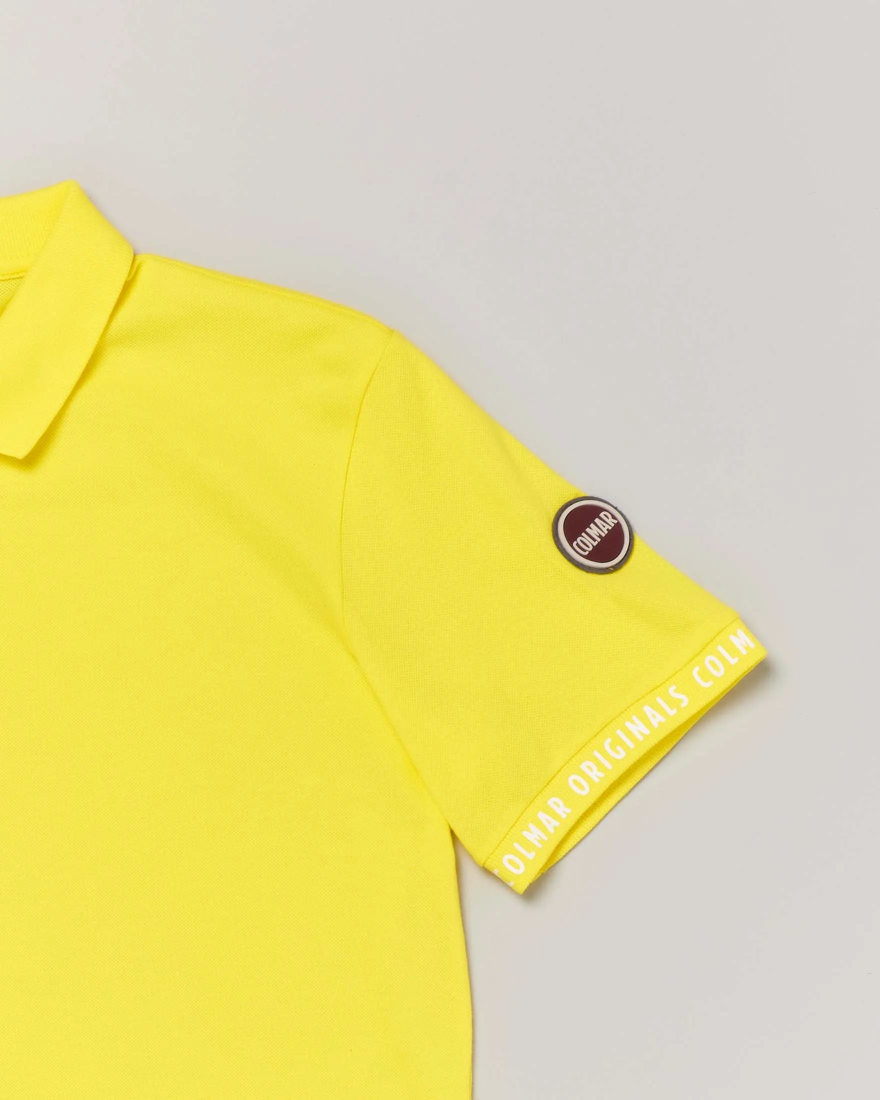 Polo gialla mezza manica in cotone stretch con logo applicato sulla manica 12-16 anni